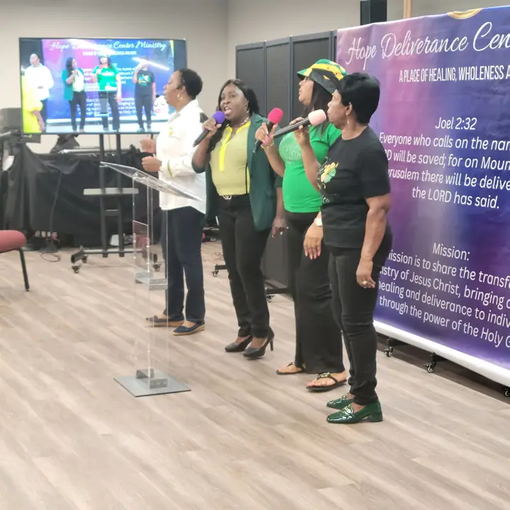 Worship team leading praise at Hope Deliverance Center